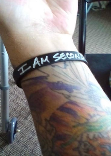 Adriany wearing his I Am Second bracelet. (Source: Facebook)